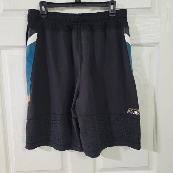 Men Size Large Nike On Field Jacksonville Jaguars NFL Athletic Shorts Black - Picture 2 of 9